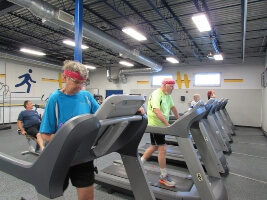 People walking on treadmills